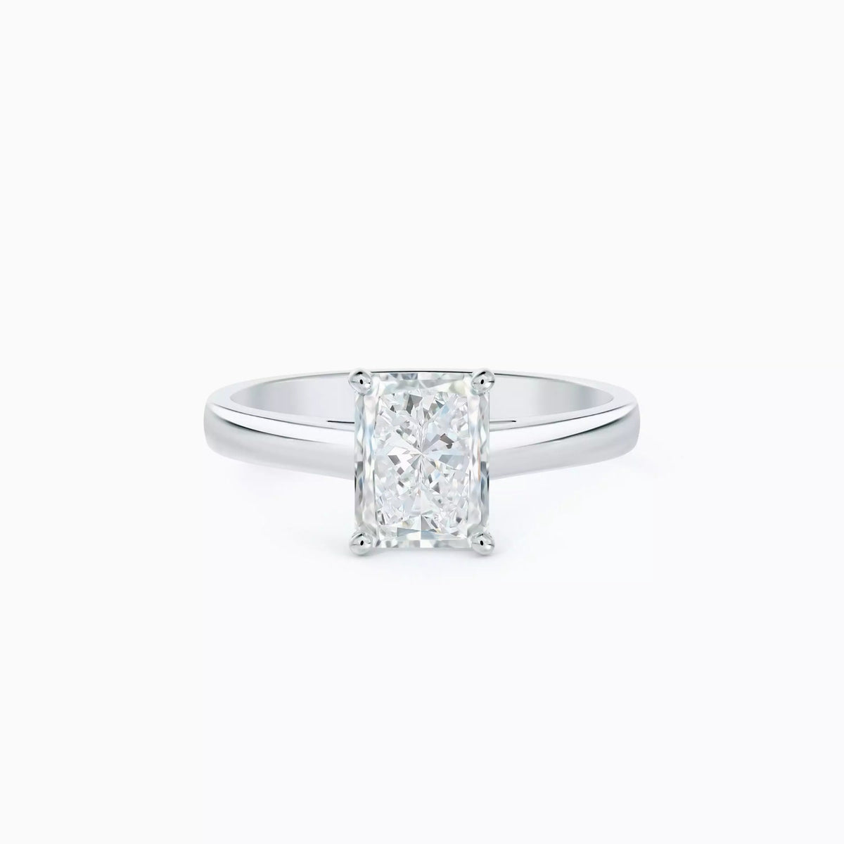 Emerald twin baguette ring